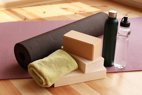 Home workout setup with yoga mat and fitness accessories
