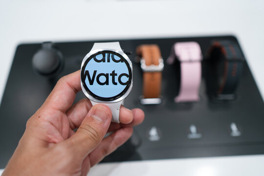 KUALA LUMPUR, MALAYSIA - AUG 16, 2025: Hand holding Samsung Galaxy Watch8 on display in Samsung Store