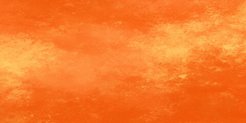 Fototapeta premium Vibrant orange textured background with yellow accents for design and decoration