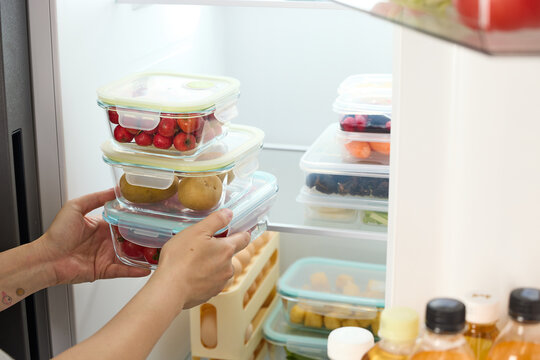 Organized refrigerator with fresh fruit in food containers