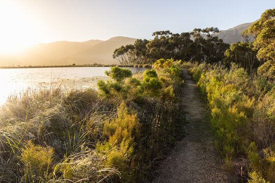 placid pond at sunset, overlooking Klein Mountains, Stanford, South Africa