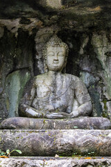 Obraz premium Seated Buddha Stone Carving at Feilai Peak in Hangzhou