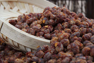 Fototapeta premium Dried Fermented Black Beans in Bamboo Basket