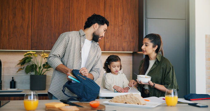 Parents, child and pack schoolbag in kitchen for morning routine, breakfast or kindergarten support. Care, kid and family getting ready with bag in home for back to school, nutrition and development