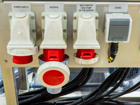 Industrial Electrical Power Panel with Labeled High-Voltage CEE Sockets and Wastewater Pump Controls