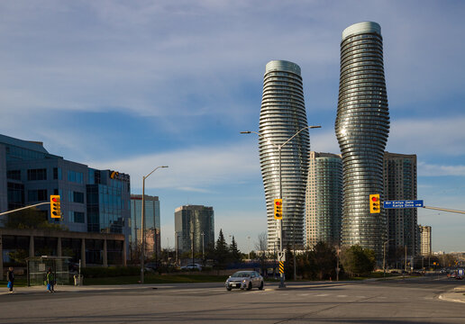 View of downtown Mississauga. Cityscape and skyline of a modern city. Panorama of the city with skyscrapers, residential buildings and a busy highway with car traffic. Mississauga, Ontario, Canada.