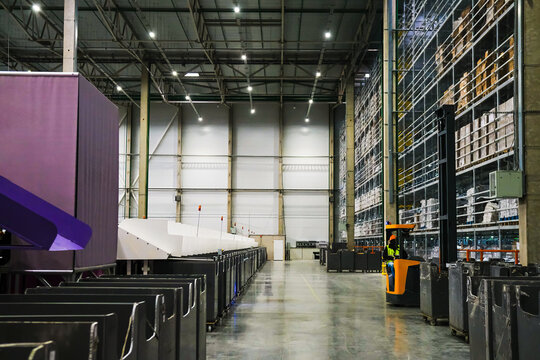 Vast industrial warehouse with organized storage.