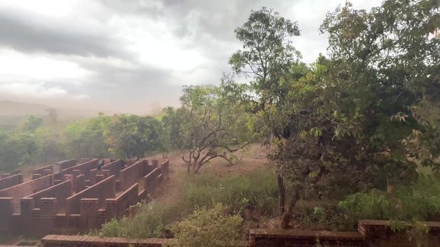 Massive dust storm in Konkan with black monsoon clouds over mango orchards