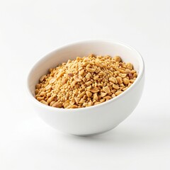 Fototapeta premium White bowl filled with crushed nuts or cereal