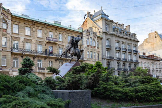 Monument to Metropolitan Andrey Sheptytsky in Lviv with historic architecture background