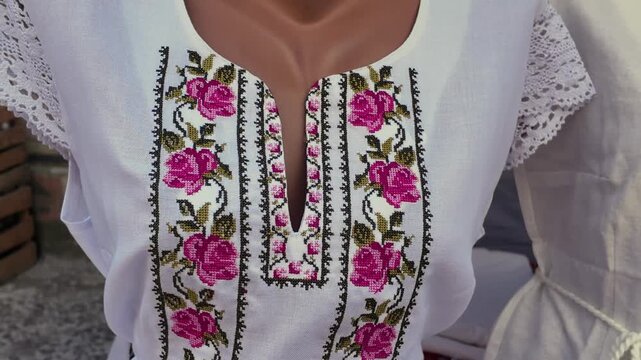 White   cotton women's blouses embroidered with floral patterns 