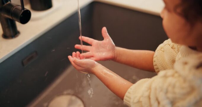 Tap, water and child washing hands in home for hygiene, wellness and learning by sink. Bathroom, splash and kid with palms under liquid for cleaning, bacteria and germs with rinse and self care