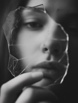 Abstract Black and White Portrait Behind Broken Glass