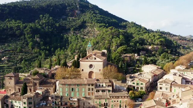 Aerial view of Valldemossa village landmark on Mallorca island in Spain. Historical architecture of cathedrals street in tourist mountain place of Europe.