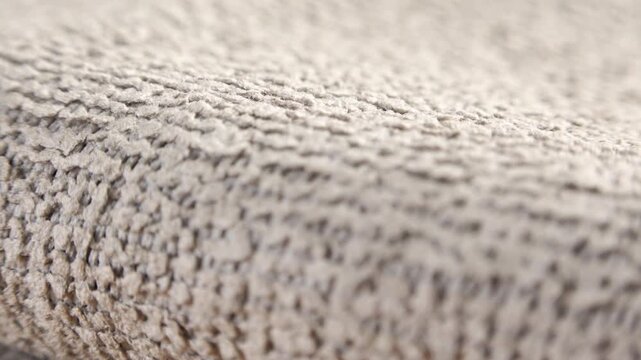 Grey micro cloth texture extreme close up with a rotating camera move stock footage