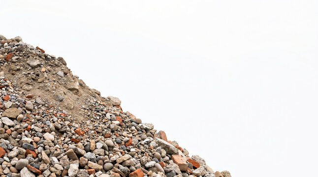 Pulverized recycled concrete aggregates and crushed stone building waste on the left of a white background with copy space for text