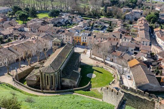 February 21, 2026. High angle aerial photograph showing the historic Saint Gimer Church in Carcassonne, France. Designed by architect Eugene Viollet le Duc in the 19th century,