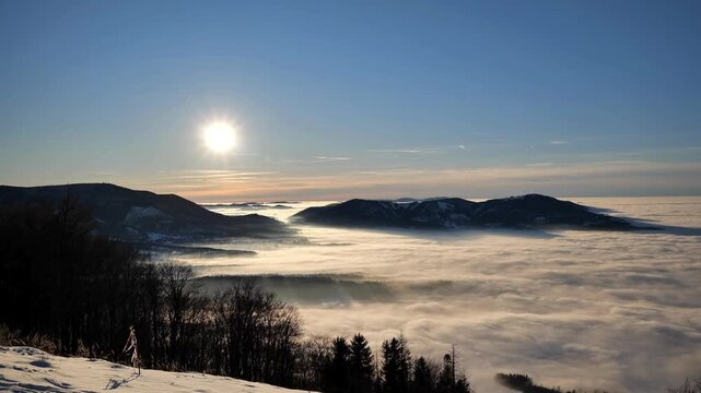 Magical timelapse of a sunset above a sea of inversion fog