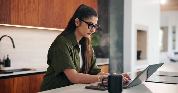 Remote work, woman and typing on laptop in kitchen for story editing, draft feedback or phone alert. Freelancer, editor and coffee in home for proofreading, article grammar or check tech notification
