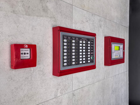 Fire alarm control panel on the wall in a public building