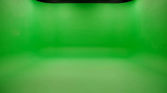 Yellow curtains parting to reveal a green screen background, creating a dynamic framing effect for video production