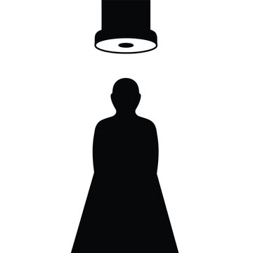 Silhouette of a person under light.