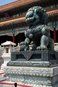 Ancient Chinese guardian lion statue at the Forbidden City in Beijing