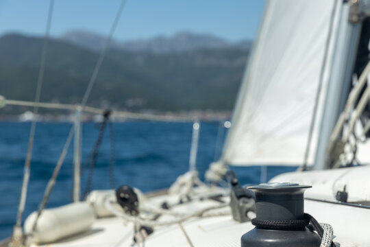 view of the seashore from a sailboat