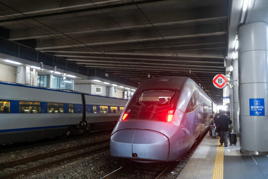 Tourist people get into KTX train to transit from Busan to Seoul, Korea