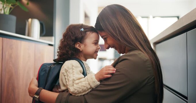 Mom, girl and hug in home with bag for back to school, kindergarten and motivation with forehead touch. Happy people, mother and daughter with embrace, support and backpack in kitchen at family house