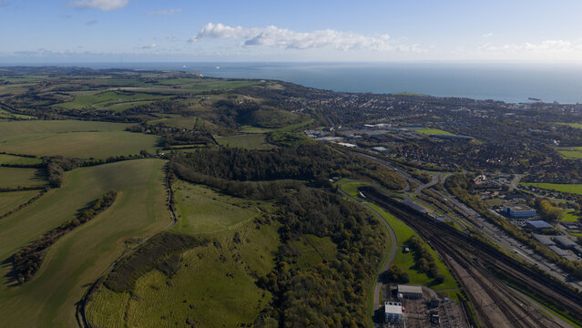 Aerial view of folkestone landscape including ocean and infrastructure