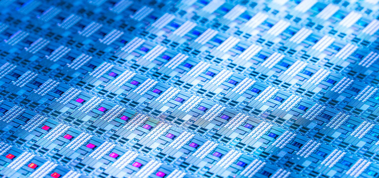 Macro background of silicon wafer semiconductor with neon color, integrated circuits to manufacture CPU and GPU
