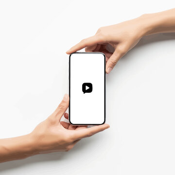 Hands holding a smartphone with social media app.