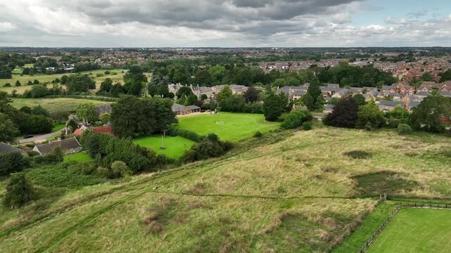 Aerial View of Open Green Fields and Village Edge Sports Ground in Barton Seagrave Northamptonshire