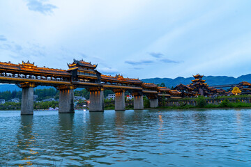 Naklejka premium The ancient covered bridge over the river is known as the No.1 covered bridge in Asia.