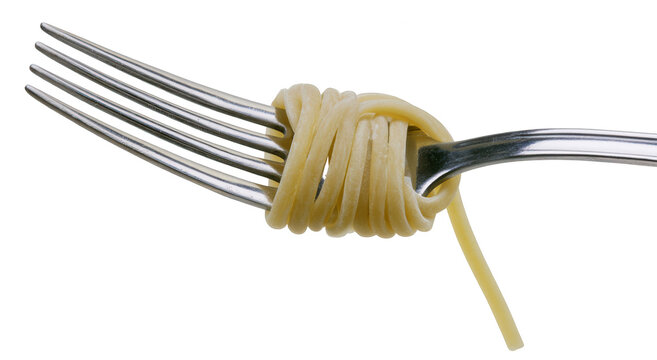A creative knot of spaghetti wrapped around a silver fork on transparent background