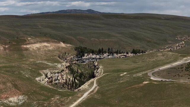 Aerial of high desert canyon next to US Highway 191 in Vernal Utah in spring