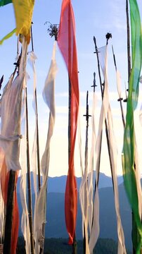 Buddhist prayer flags blowing In the wind. Shot in Bhutan.