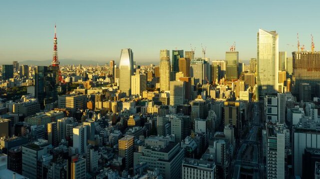 Time Lapse of the densely packed buildings of Tokyo Japan at sunrise