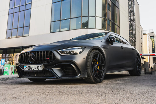 Almaty, Kazakhstan - March 29, 2026: A black Mercedes-AMG GT 63 V8 BiTurbo 4MATIC in a parking lot