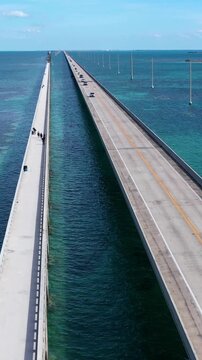 Aerial shot of the Seven Mile Bridge in Florida which connects several of the Florida Keys on the way to Key West. Vertical Video.