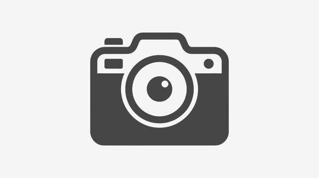 Minimalist camera icon, black silhouette on a light grey background, simple and modern design