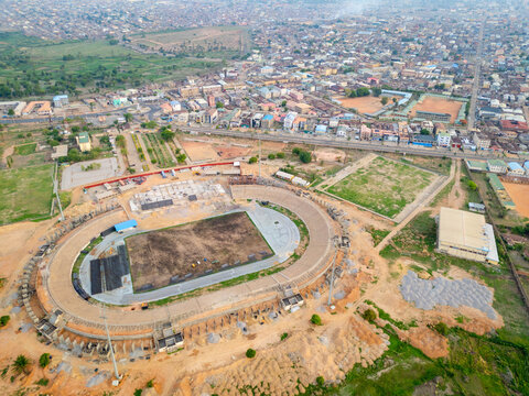 Kaduna, Nigeria - 13 May 2026: Aerial view of Ahmadu Bello Stadium under renovation with construction materials and surrounding urban cityscape.