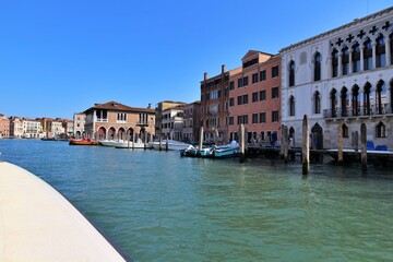 Obraz premium Old town viewed from a water shuttle bus on the Grand Canal in the San Polo district of Venice, Italy