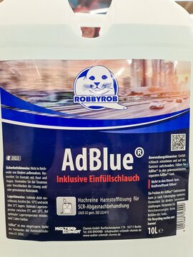 Kiel, Germany - 06. May 2026: AdBlue container promoting clean diesel technology