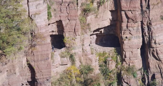 Tourists on Guoliang Cliffside Tunnel Road in Henan China in Guoliang, Henan, China