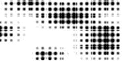 Fototapeta premium Abstract halftone black and white. The pattern of dots of ink gradient