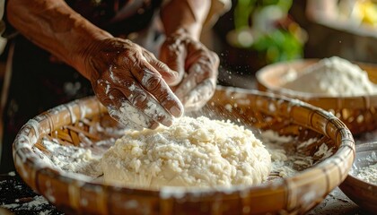 Fototapeta premium Hands Kneading Dough in Wooden Bowl - A Culinary Tradition.