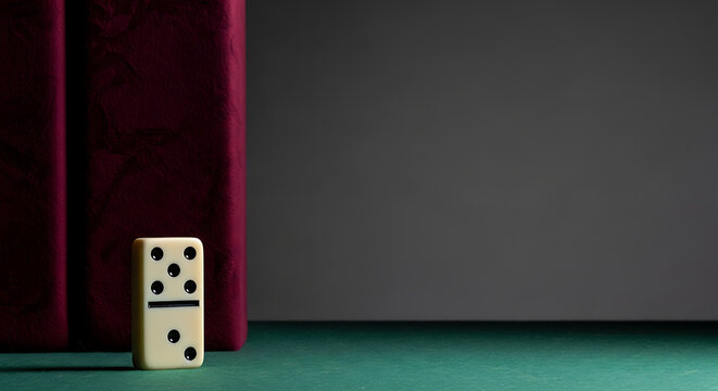 Single white dice with black dots.