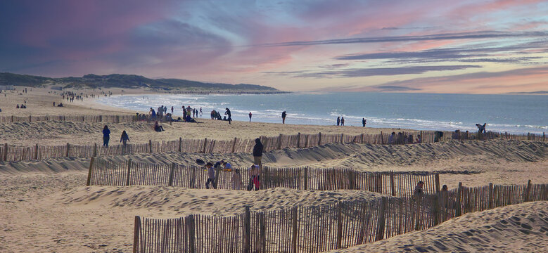 Calais beach with wooden fences to protect the beach from the wind before the summer season